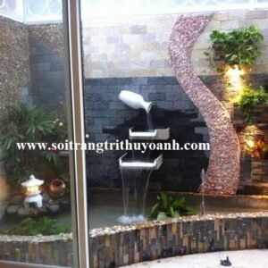 Tiểu cảnh sân vườn được trang trí bằng đá và sỏi hồng tự nhiên