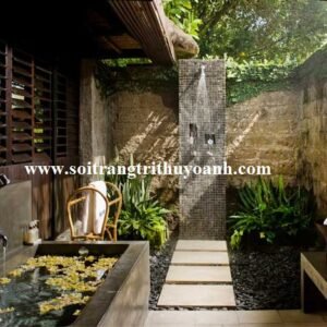 Phòng tắm ngoài trời đẹp trang trí bằng sỏi đen tự nhiên