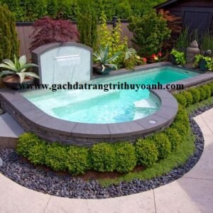 Sỏi đen tự nhiên trang trí xung quanh hồ bơi