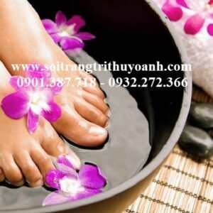 Trị liệu massage chân bằng những viên sỏi bóng